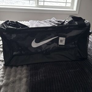 NWT Nike sport duffle , basketball, travel , black with grey camo accents